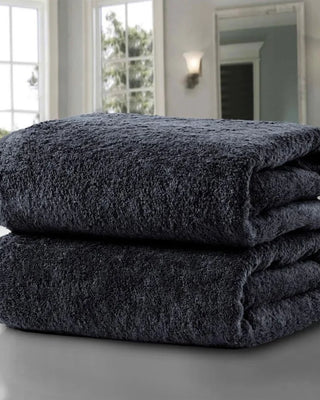 Black 100% cotton bath towels with a soft, absorbent and durable finish, suitable for bathrooms, hotels, Airbnb accommodation, spas and Australian households.