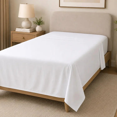 Grande Hotel white flat sheet on a modern bed, made from a soft cotton blend for comfortable sleep, hotel-style bedding and everyday use in Australian homes and guest accommodation.
