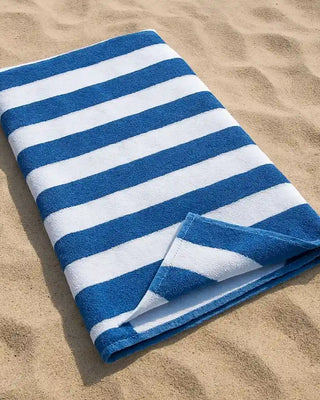 Large blue and white striped cotton beach towel made from premium 100% cotton, offering a soft, absorbent and oversized design for the beach, pool, holidays and outdoor living in Australia.