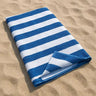 Large blue and white striped cotton beach towel made from premium 100% cotton, offering a soft, absorbent and oversized design for the beach, pool, holidays and outdoor living in Australia.