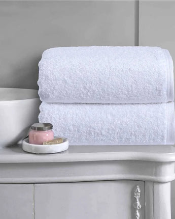 White 100% cotton bath towels with a plush, hotel-quality finish, offering excellent absorbency and softness for family bathrooms, hotels and Australian homes.