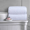 White 100% cotton bath towels with a plush, hotel-quality finish, offering excellent absorbency and softness for family bathrooms, hotels and Australian homes.